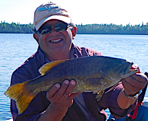 Great BIG Trophy Smallmouth Bass by Henry Fishing at Fireside Lodge in Canada